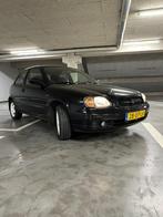 Suzuki Baleno 1.6 Sport 1999 Zwart, Auto's, Suzuki, Origineel Nederlands, Te koop, 885 kg, 5 stoelen