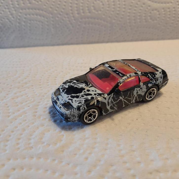 Matchbox Nissan 300ZX gemarmerd, Hobby en Vrije tijd, Modelauto's | Overige schalen, Zo goed als nieuw, Auto, Ophalen of Verzenden