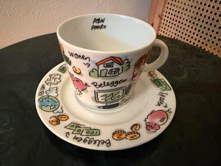 Blond Amsterdam kop en schotel ABN AMRO, Huis en Inrichting, Keuken | Servies, Zo goed als nieuw, Kop(pen) en/of Schotel(s), Blond Amsterdam
