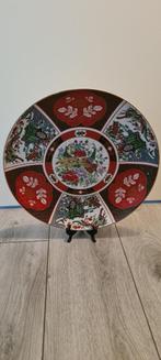 Chinese porceleinen bord, Ophalen