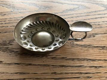 Zilveren tastevin beschikbaar voor biedingen