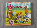 Arend van Dam & Alex de Wolf - Op een dag... (boek), Boeken, Ophalen of Verzenden, Zo goed als nieuw, Arend van Dam