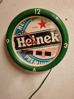 Heineken meleniumklok bieden, Ophalen