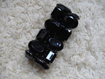Zwarte Armband. Elastiek band. beschikbaar voor biedingen