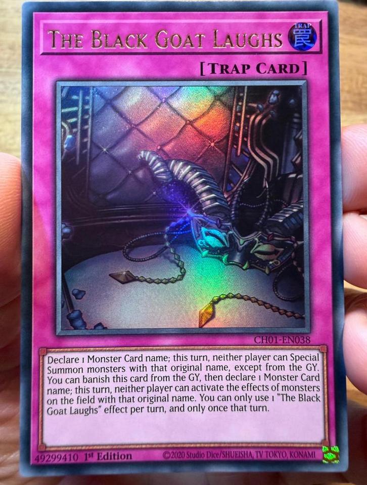 Yu-Gi-Oh! The Black Goat Laughs CH01 1st Edition !, Hobby en Vrije tijd, Verzamelkaartspellen | Yu-gi-Oh!, Zo goed als nieuw, Losse kaart