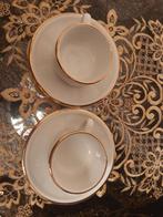 2 merk Apilco Porseleinen Kopjes met Schotels - Wit & Goud, Ophalen of Verzenden, Zo goed als nieuw, Effen, Kop(pen) en/of Schotel(s)