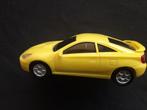 Toyota Celica 2003 T230 geel, plastic ca 1:36, Hobby en Vrije tijd, Ophalen of Verzenden, Zo goed als nieuw, Auto