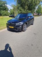 BMW X1 Sdrive20i 192pk Aut 2019 Zwart, Auto's, 1998 cc, 1800 kg, Zwart, Bedrijf