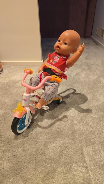 Baby Born pop met accessoires + fiets beschikbaar voor biedingen