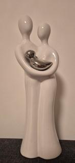 Beeld familie., Ophalen