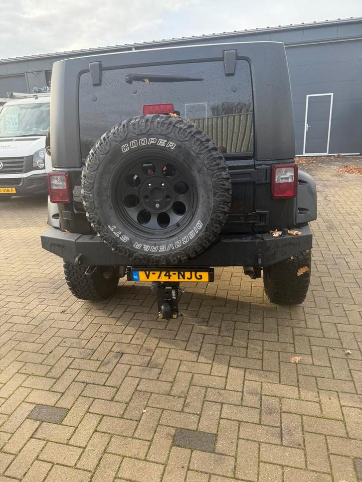 Jeep wrangler 2011 Zwart, Auto's, Bestelauto's, Particulier, 4x4, ABS, Achteruitrijcamera, Airconditioning, Bluetooth, Lederen bekleding