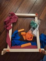 Kinderweefgetouw, Ophalen