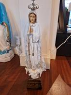 Beeld Fatima met drie witte duiven, Ophalen