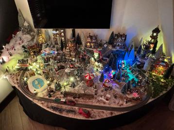 Kerstdorp compleet met trein en verlichting beschikbaar voor biedingen