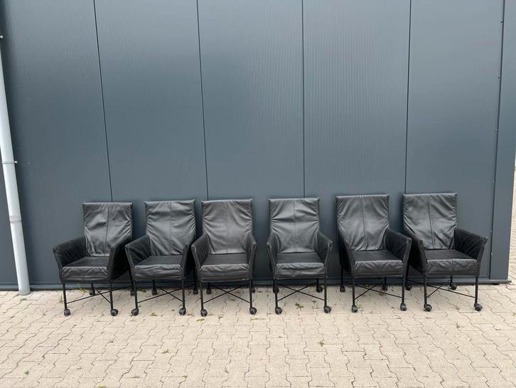 Montis chaplin eetkamerstoel - zwart leer wieltjes, Huis en Inrichting, Stoelen, Zo goed als nieuw, Vijf, Zes of meer stoelen