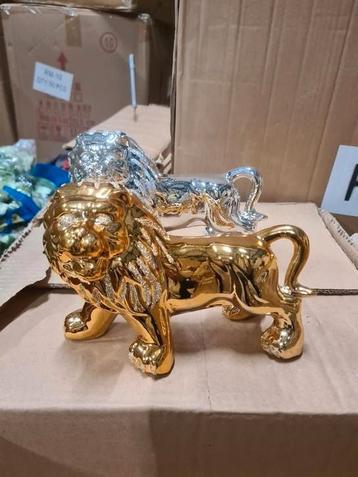 GROOTHANDEL UITVERKOOP leeuwenbeeldjes goud en zilver kleur beschikbaar voor biedingen