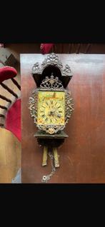 Friese stoelklok, Ophalen