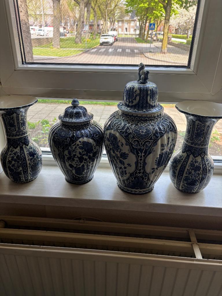 Delfts blauwe vazen, Ophalen