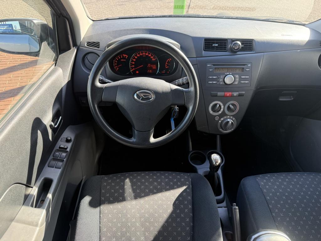 Daihatsu Cuore 1.0 Premium 5drs airco zeer nette auto, Auto's, Daihatsu, Metallic lak, 18 €/maand, 4 stoelen, Cuore