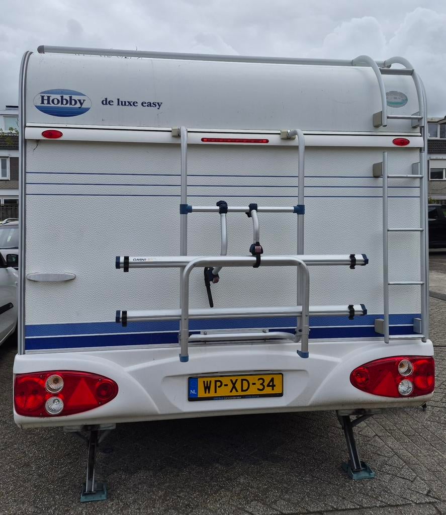 Caravan Hobby 500 kmfe met stapelbed en vast bed., Caravans en Kamperen, Caravans, Vast bed, Kachel, Hobby, Treinzit