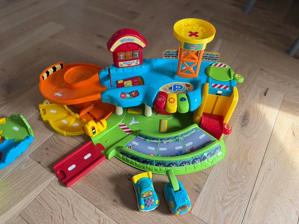Vtech Toet Toet auto garage en wegdelen met 5 autos, Kinderen en Baby's, Speelgoed | Vtech, Ophalen of Verzenden, Zo goed als nieuw