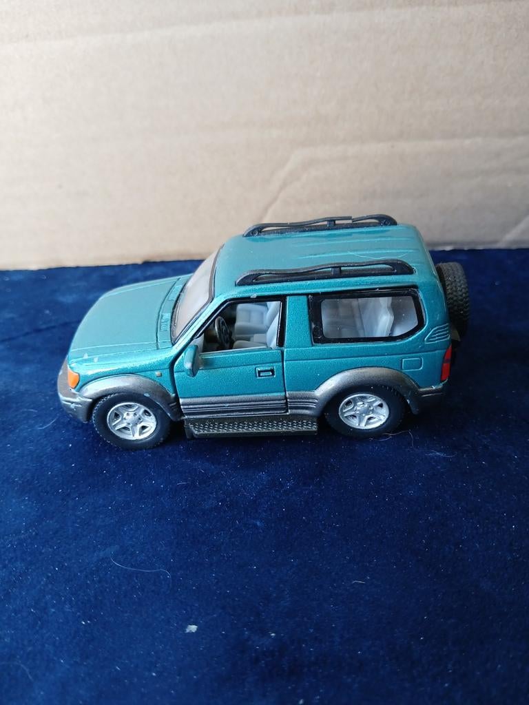 Toyota Landcruiser. Hongwel 1:43, Hobby en Vrije tijd, Modelauto's | 1:43, Ophalen of Verzenden, Gebruikt, Auto, Overige merken