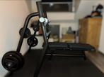 TechnoGym Bench met gewichten en stang, Ophalen, Krachtstation, Armen, Zo goed als nieuw