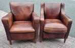 2 aparte schapenleren fauteuils cognac kleur + BEZORGING