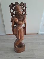 Houtsnijwerk, fluitist, Ophalen