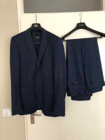 Kostuum Digel maat 106 blauw beschikbaar voor biedingen