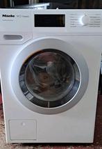 Miele wasmachine, Ophalen