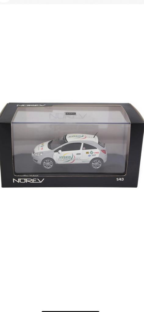 OPEL CORSA “D”-testauto met CORSA “E” hybrid technology, Hobby en Vrije tijd, Modelauto's | 1:43, Nieuw, Auto, Norev, Ophalen of Verzenden
