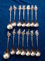 12x dierenbescherming en 2x suikerlepel verzilverd, Antiek en Kunst, Antiek | Bestek, Ophalen of Verzenden