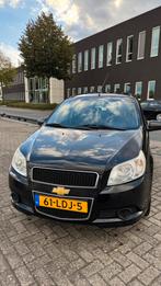 Chevrolet Aveo 1.2 16V 5D 2010 Zwart, Auto's, Voorwielaandrijving, 4 cilinders, 400 kg, Zwart
