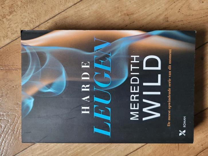 Meredith Wild - Harde leugen, Boeken, Romans, Zo goed als nieuw, Ophalen of Verzenden