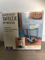 Nieuw in doos glazen bijzet tafel op wielen, 45 tot 60 cm, Minder dan 55 cm, Rond, Nieuw