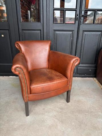 Runderleren fauteuil beschikbaar voor biedingen