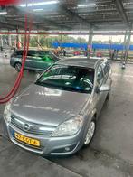 Opel Astra 1.8 16V St.wgn 2009 Grijs, Auto's, Voorwielaandrijving, Zwart, 1796 cc, Stationwagon