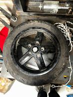 Vespa velg met michelin band, Ophalen