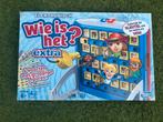 Wie is het? Extra Bordspel - Zo goed als nieuw, Hobby en Vrije tijd, Gezelschapsspellen | Bordspellen, Een of twee spelers, Ophalen of Verzenden