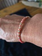 Te koop oranjekleurige armband., Ophalen of Verzenden, Zo goed als nieuw, Oranje, Overige materialen