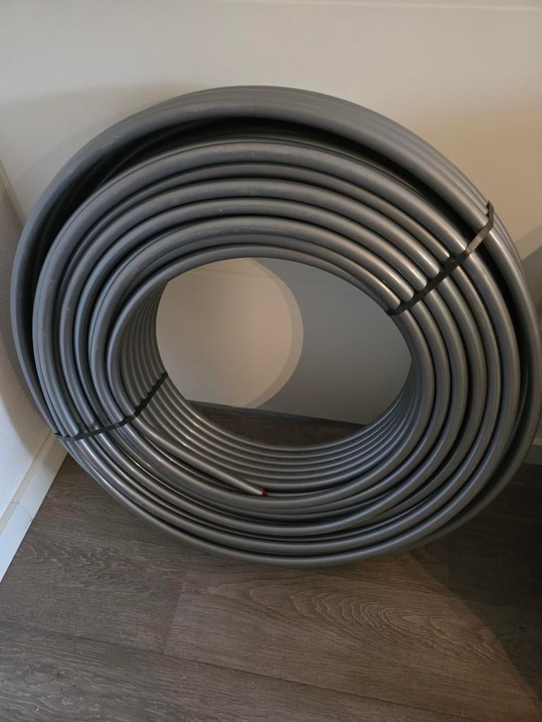 Rehau Rautitan Stabil 25 x 3.7 op rol van 50mtr., Doe-het-zelf en Verbouw, Buizen en Afvoer, Nieuw, Overige typen, Overige materialen