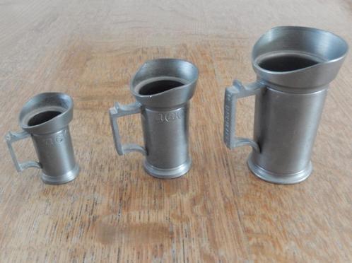 3 Tinnen maatbekers van engeltjes tin., Antiek en Kunst, Antiek | Tin, Ophalen of Verzenden