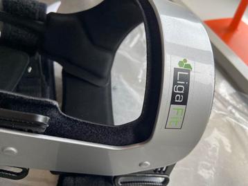 Kniebrace nieuw Fitline, met reserve onderdelen beschikbaar voor biedingen