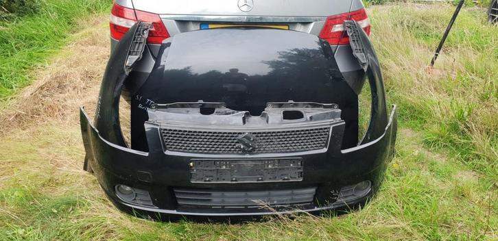 SUZUKI SWIFT VOORBUMPER +MOTORKAP +VOORSCHERMEN BJ 2007, Auto-onderdelen, Carrosserie en Plaatwerk, Bumper, Voor, Gebruikt, Ophalen of Verzenden