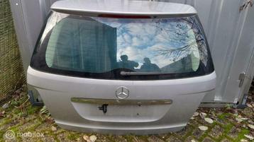 Achterklep grijs metallic Mercedes M-klasse W164 ('05-'11) beschikbaar voor biedingen
