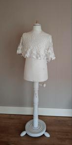 Paspop met kanten kraag, Ophalen