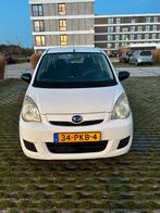 Daihatsu Cuore 1.0 5D 2011 Wit, Auto's, Voorwielaandrijving, Stof, 600 kg, Zwart