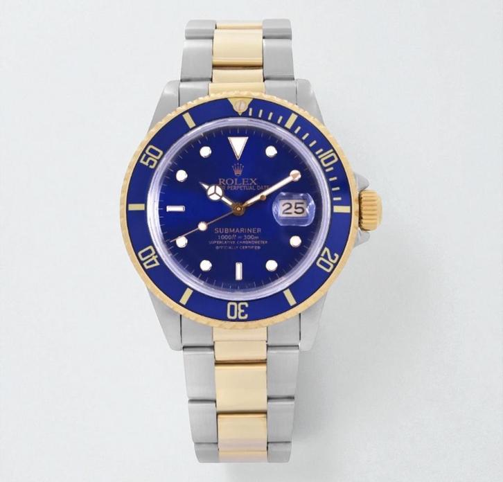 Rolex Submariner Date 16613LB “ bluesy “ met garantie., Sieraden, Tassen en Uiterlijk, Horloges | Heren, Zo goed als nieuw, Rolex
