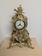 Grote bronzen pendule, Ophalen